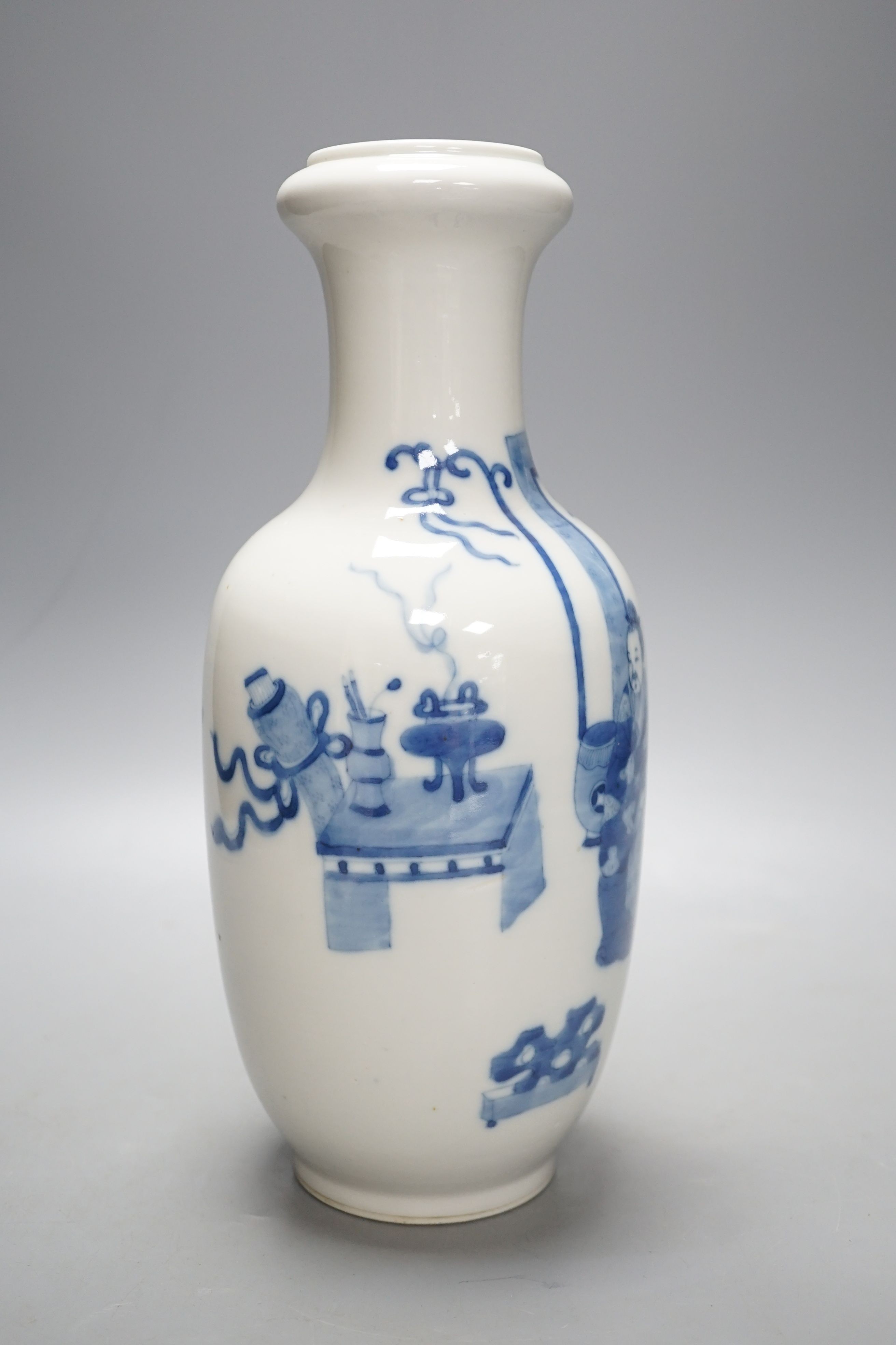 A Chinese blue and white ‘sages’ vase, 27 cms high.